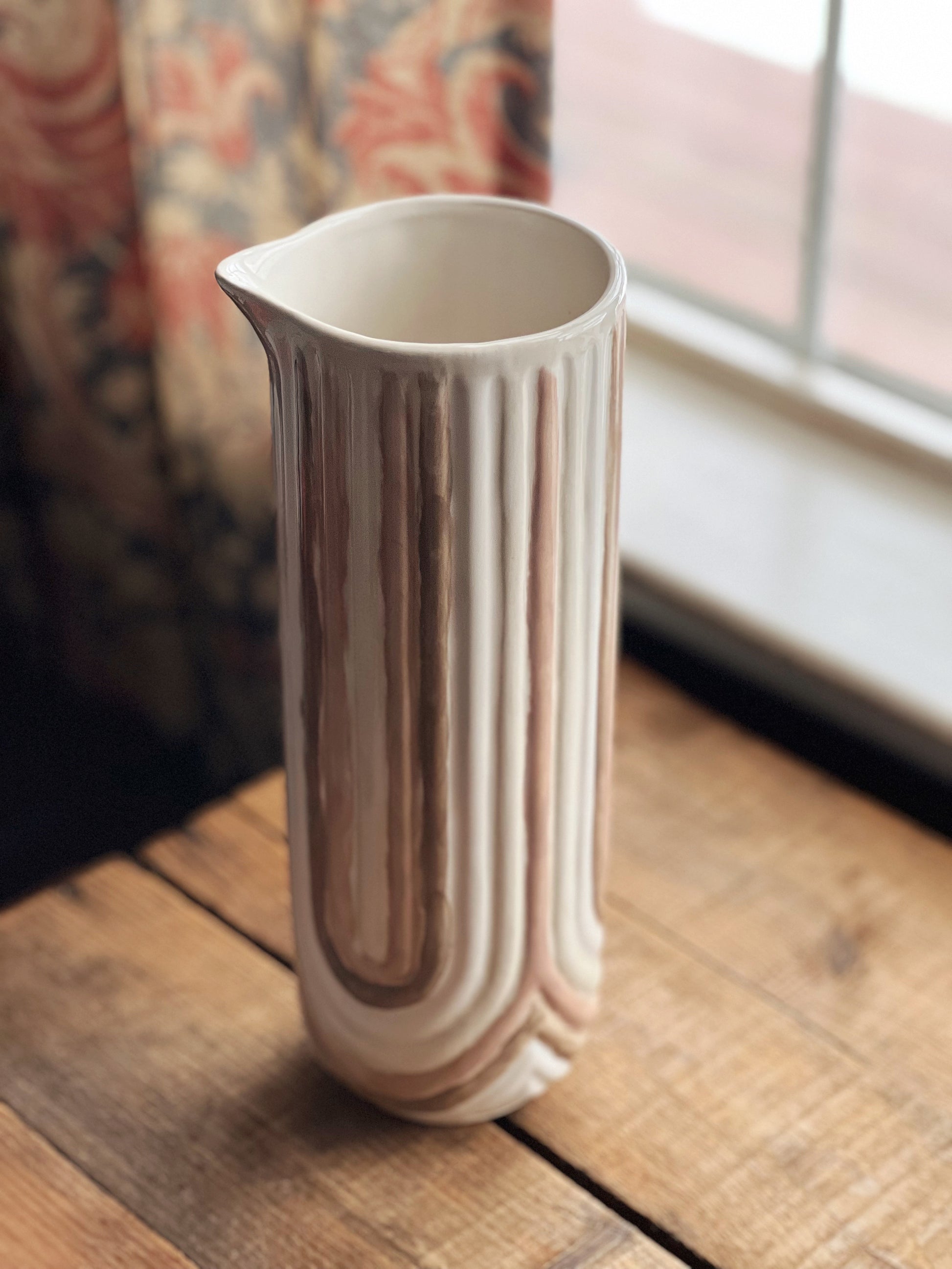 vintage pitcher with pink and taupe stripes