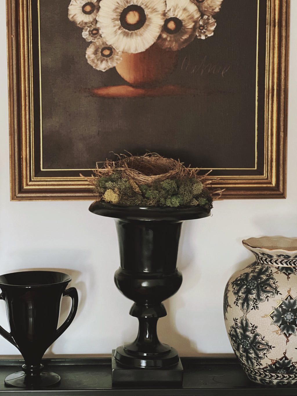 Large Black Urn with Birds Nest