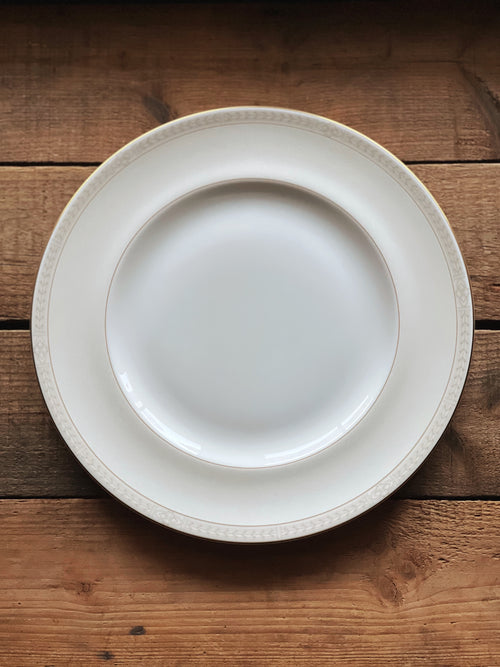 White plate on a wooden surface
