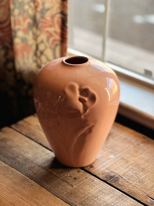 vintage peachy pink vase with an embossed floral design