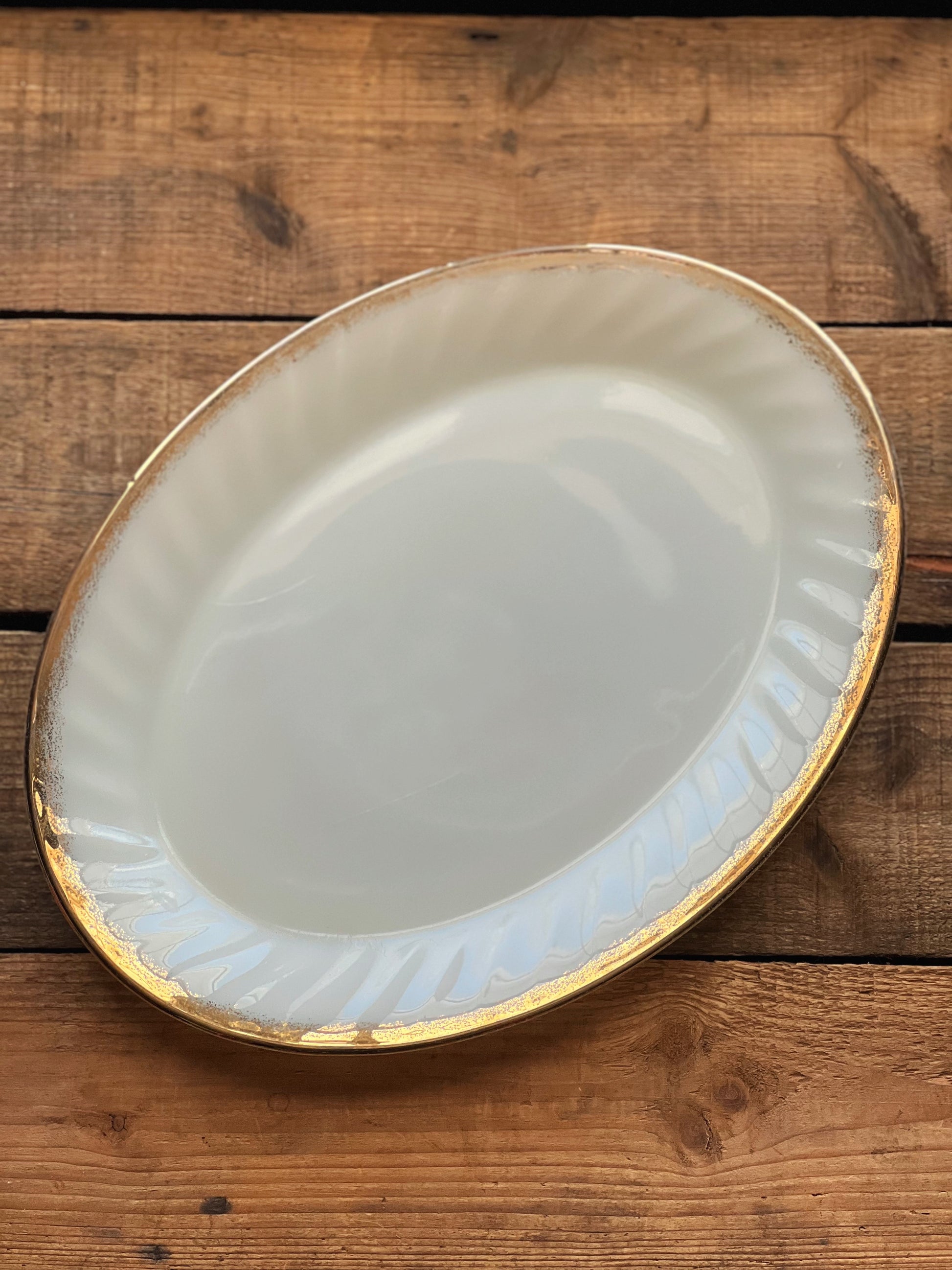 white milk glass platter with gold rim