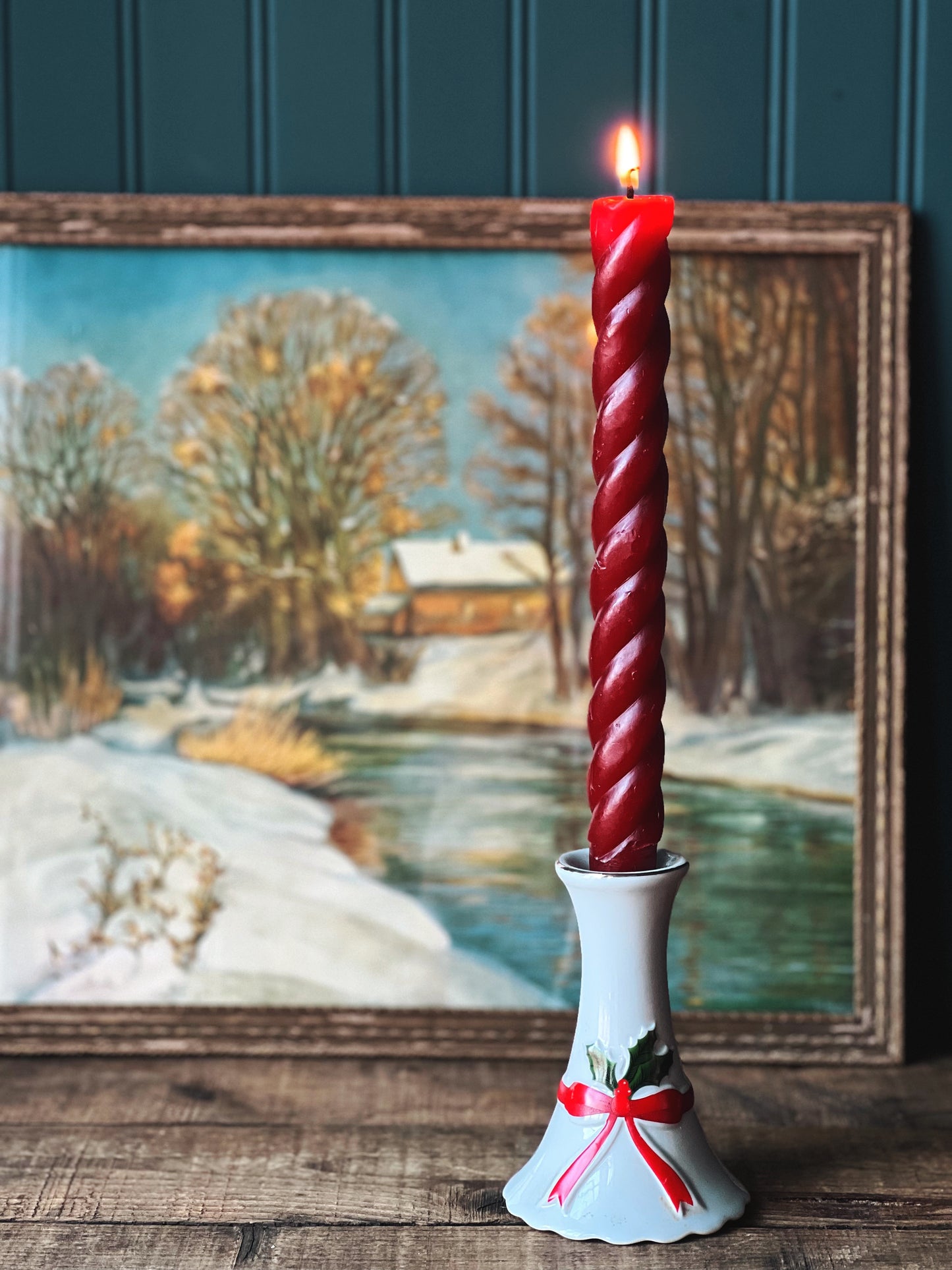 white ceramic Christmas candleholder  with a red bow