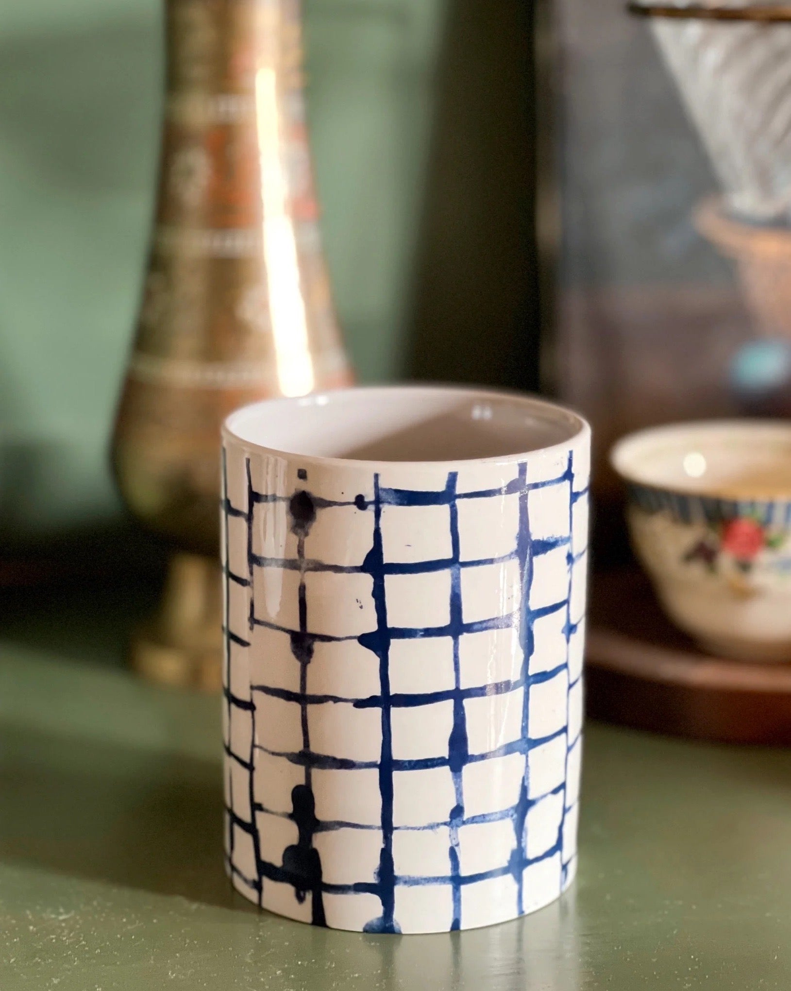 navy and white plaid crock