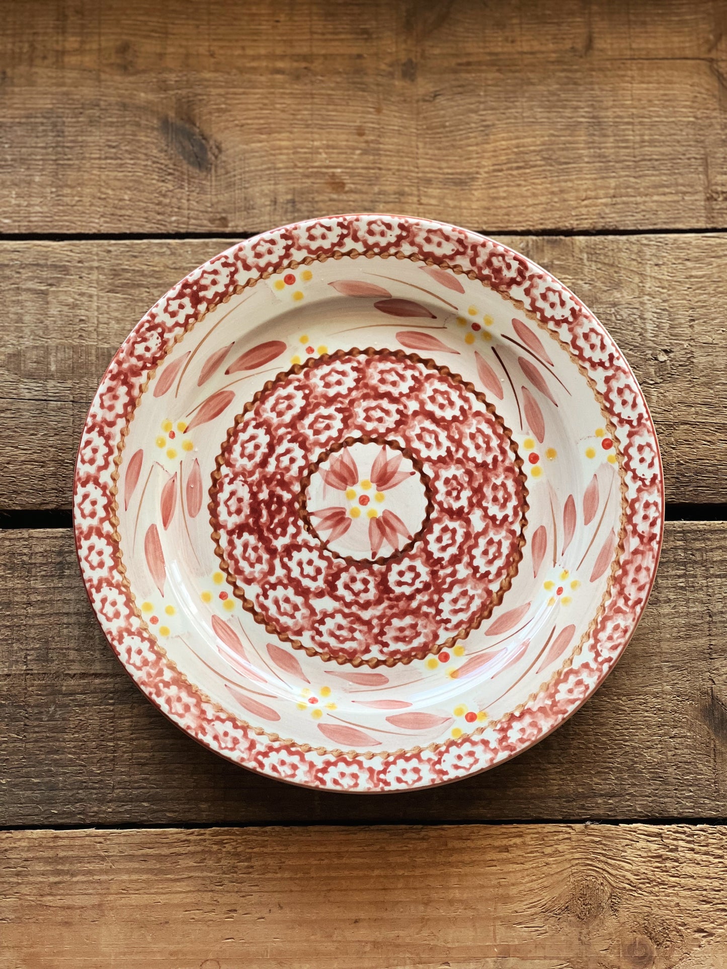 cranberry and yellow pattern salad plate