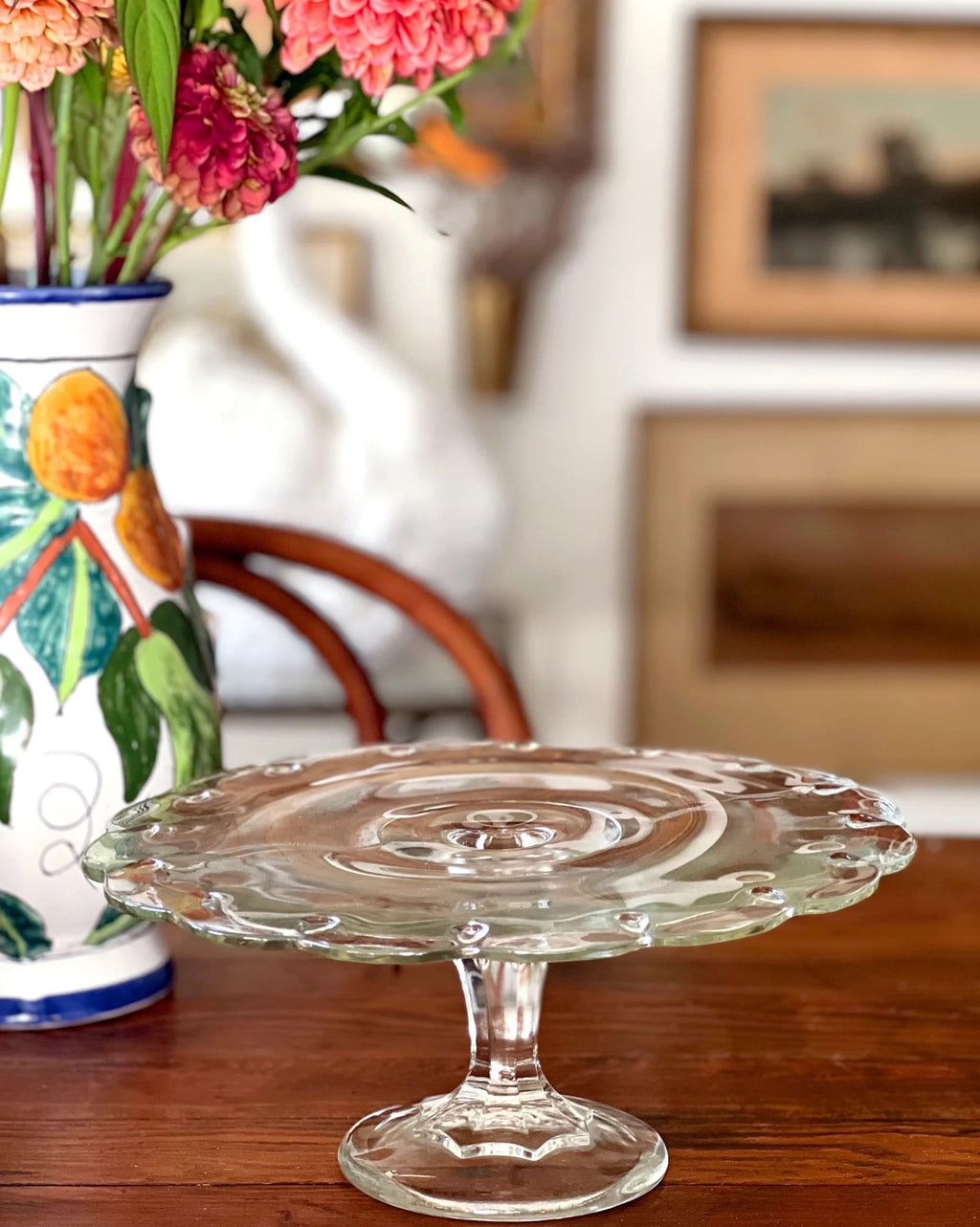 clear glass cake stand on a table