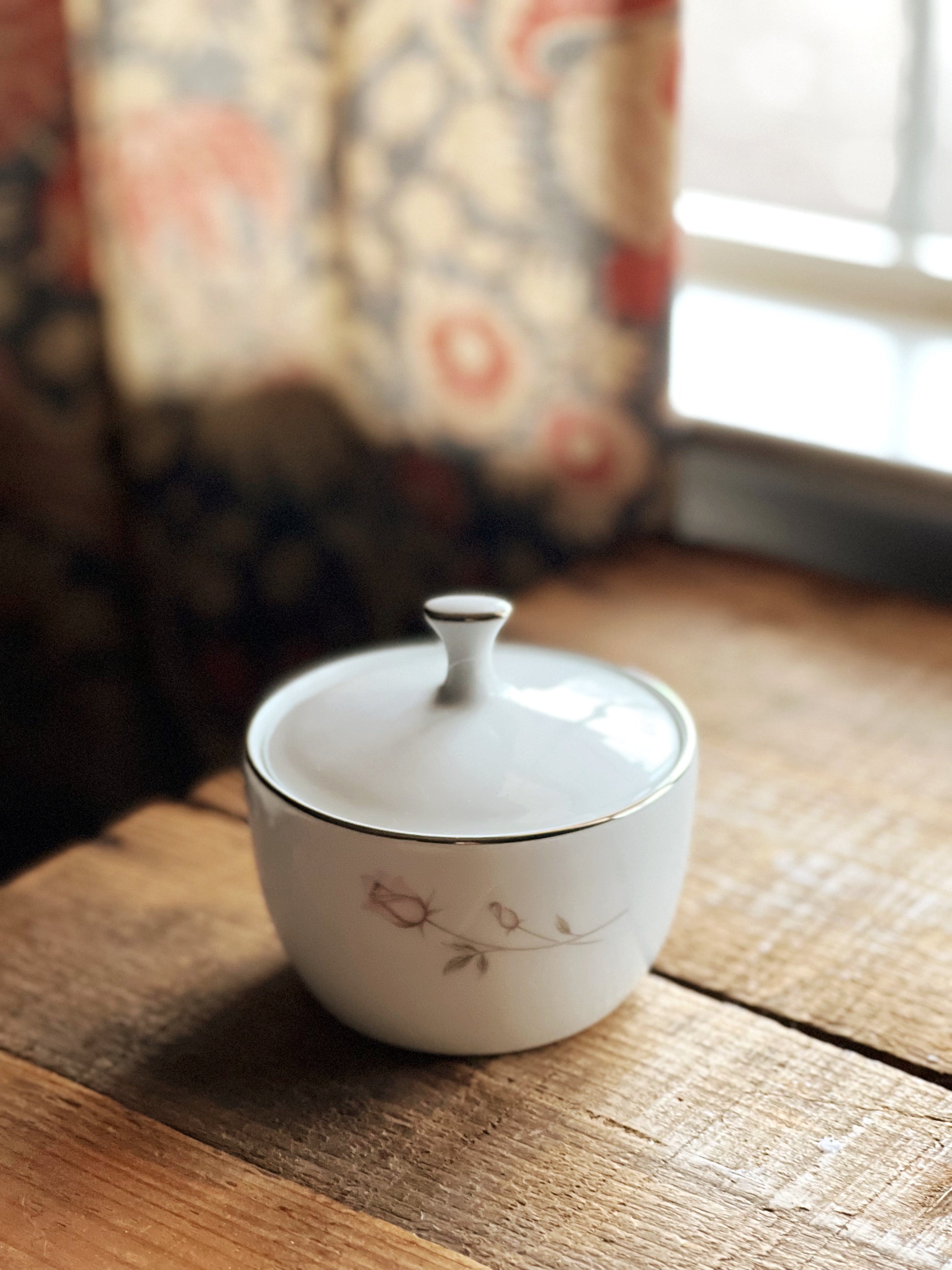 white sugar bowl with a pink rose and platinum trim