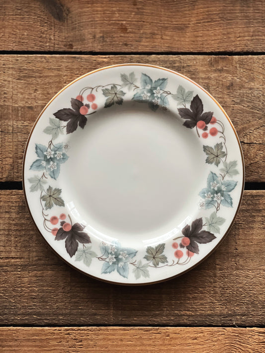 blue, gray and brown leaf print plate with berries