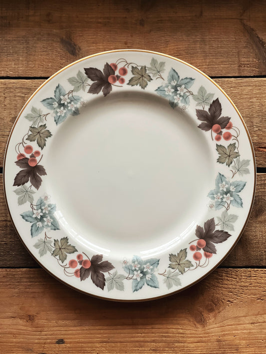 blue, gray and brown leaf print plate with berries