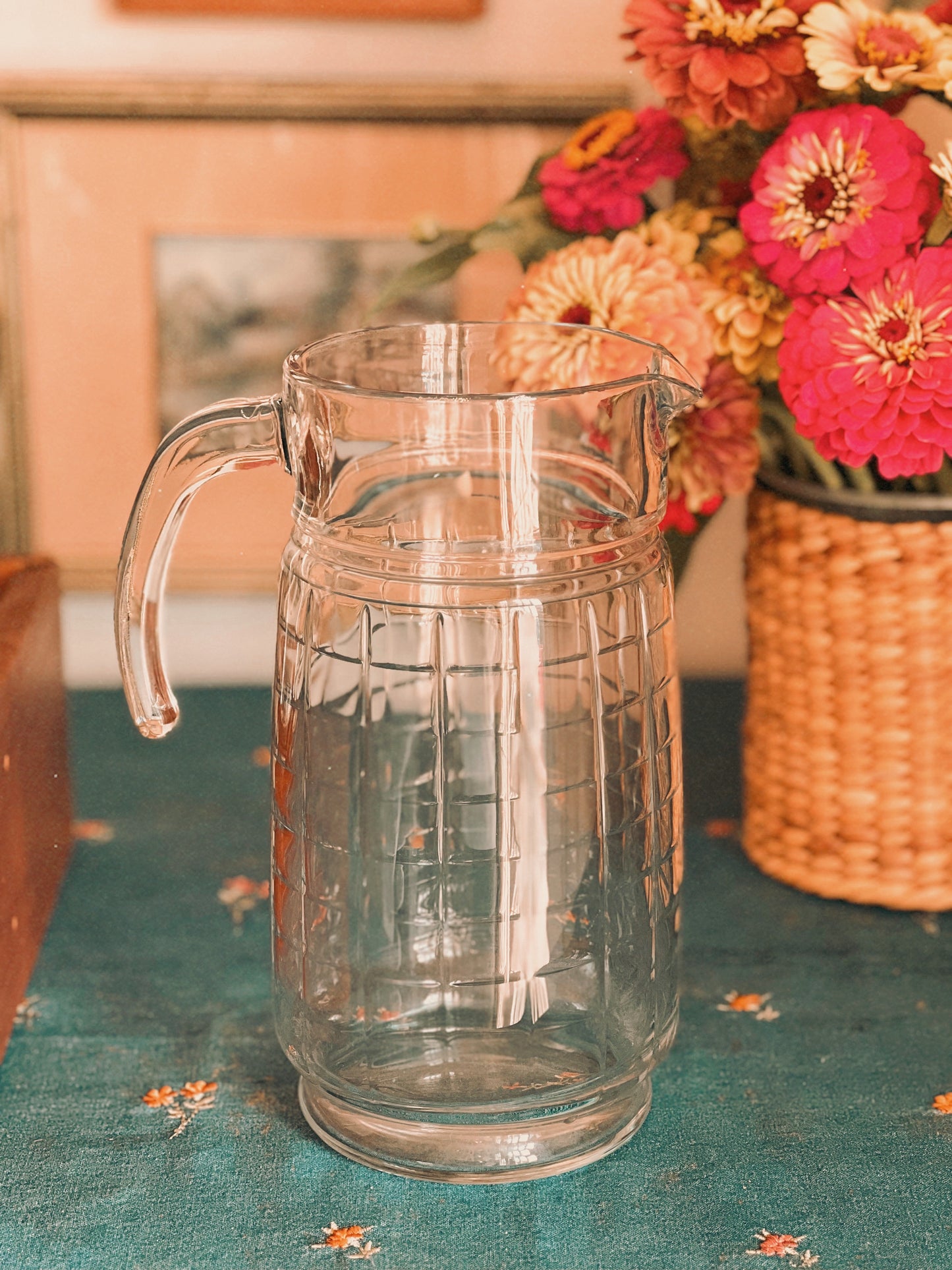 Vintage clear glass pitcher with a checkerboard pattern 