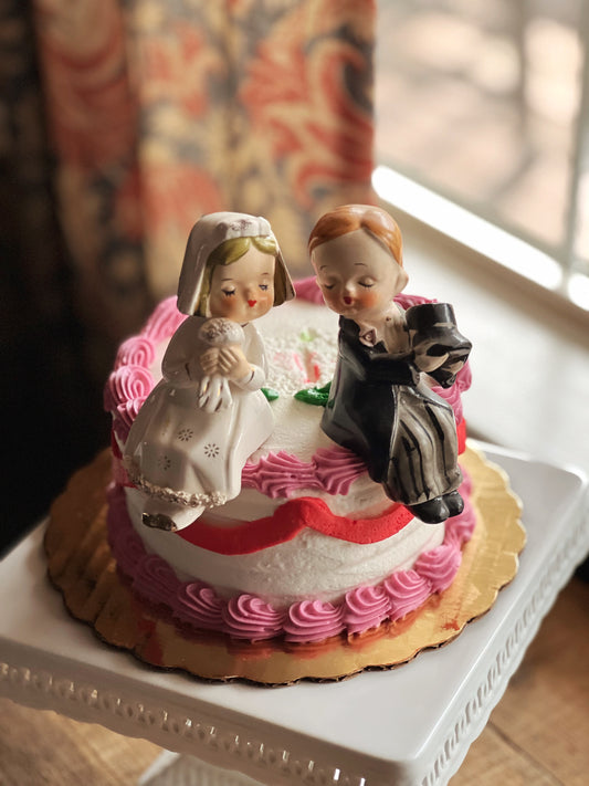 hand painted kissing bride and groom cake topper