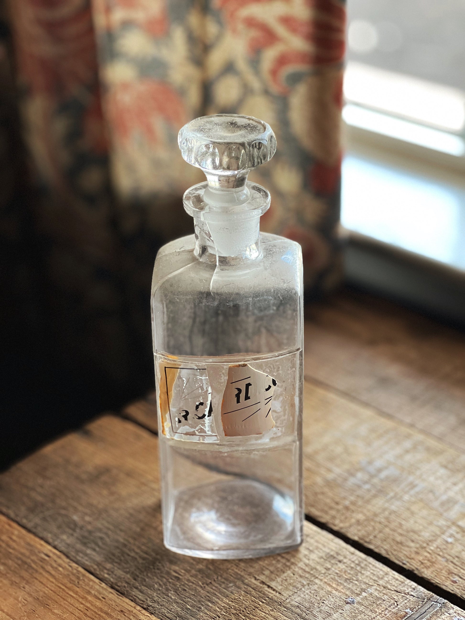 vintage pharmacy bottle with lid