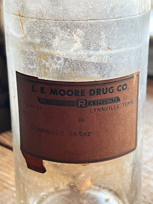 Vintage Glass L.E. Moore Drug Co Lynnville TN Medicine Bottle