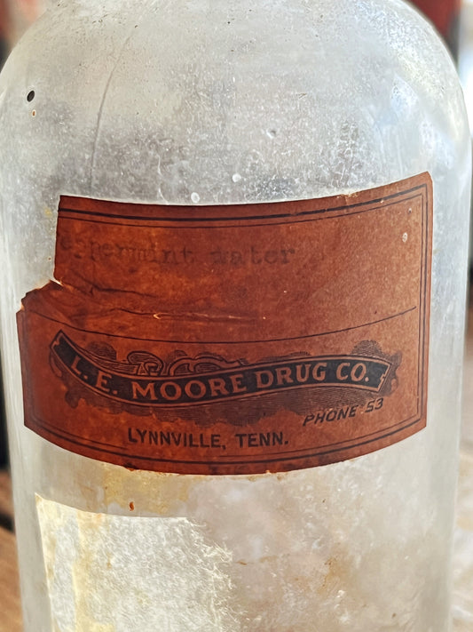 Vintage Glass L.E. Moore Drug Co Lynnville TN Medicine Bottle with Lid