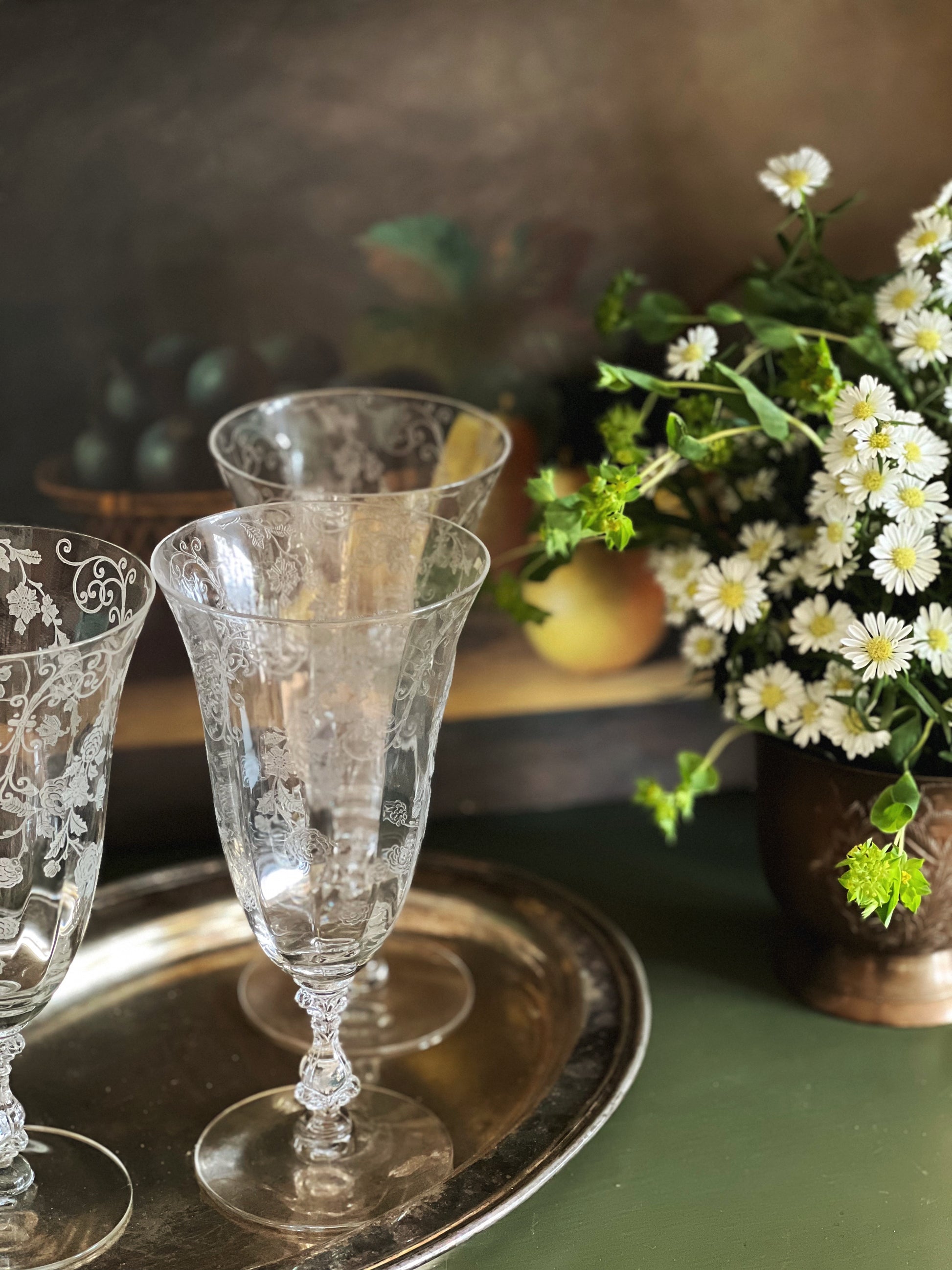 vintage wine glass with an etched floral design