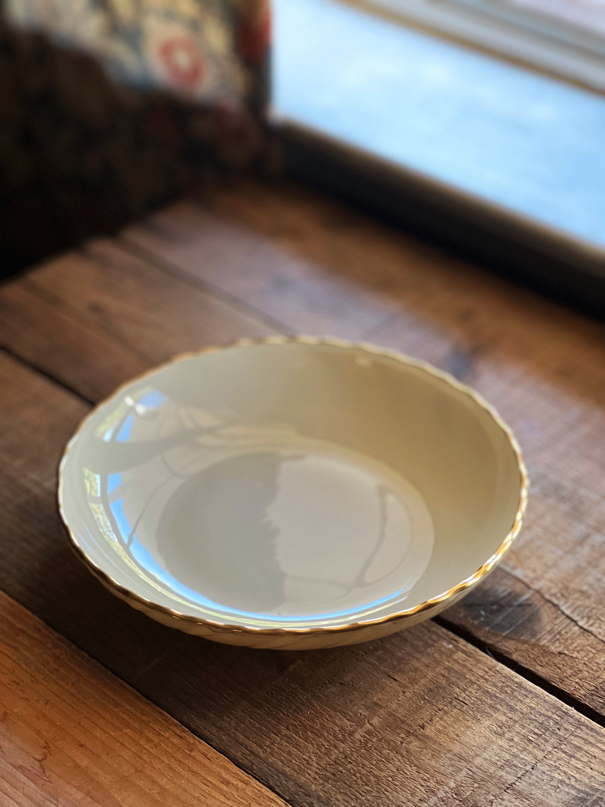 ivory and gold rim soup bowl