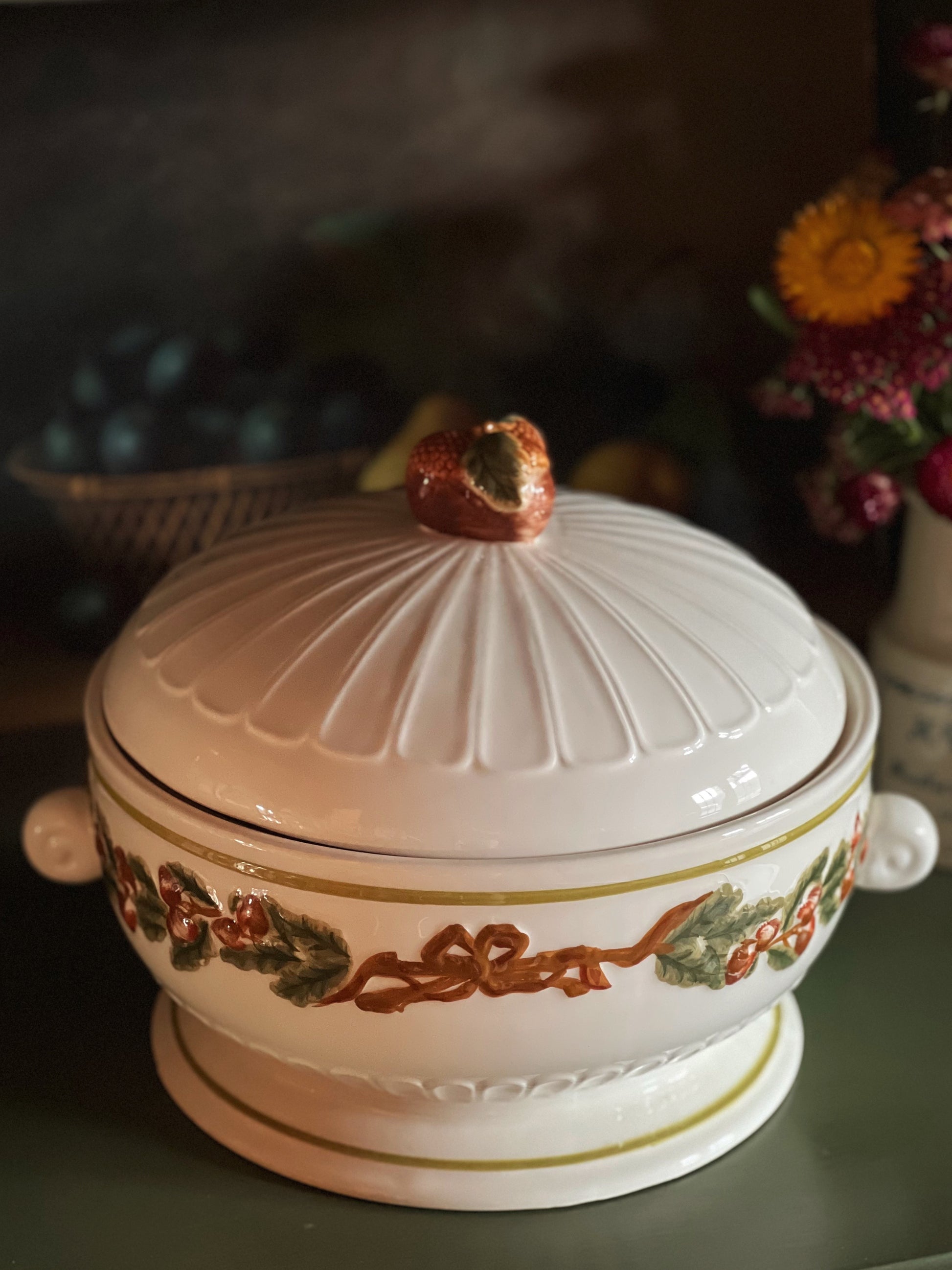 ceramic tureen with an acorn and bow design