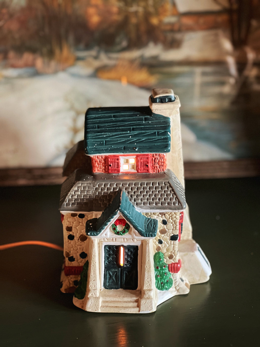 light up Christmas village house with a double front door and gray roof