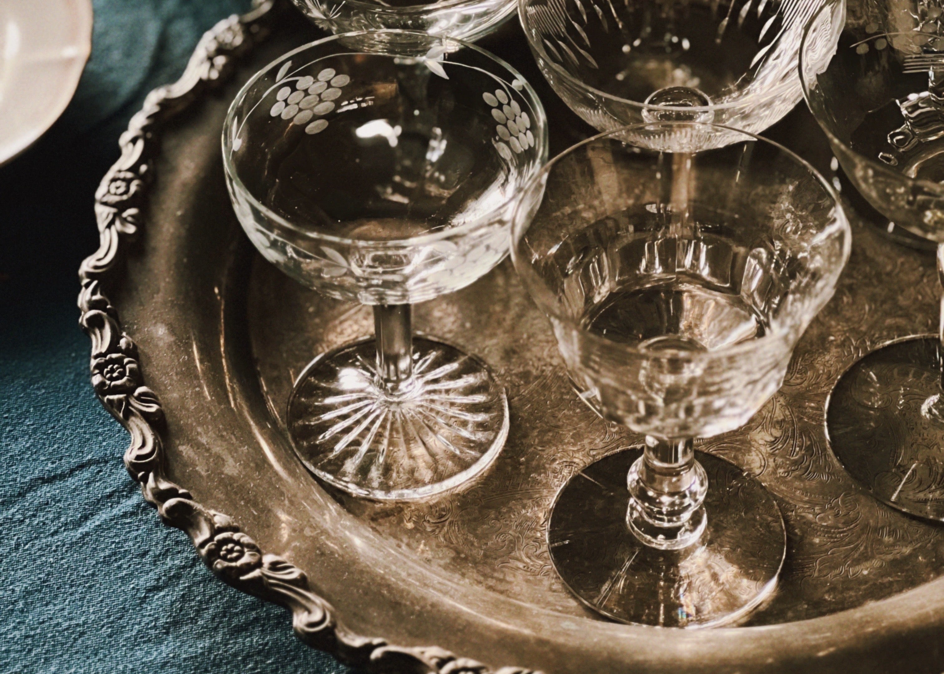 Decorative tray with crystal glasses on a table setting