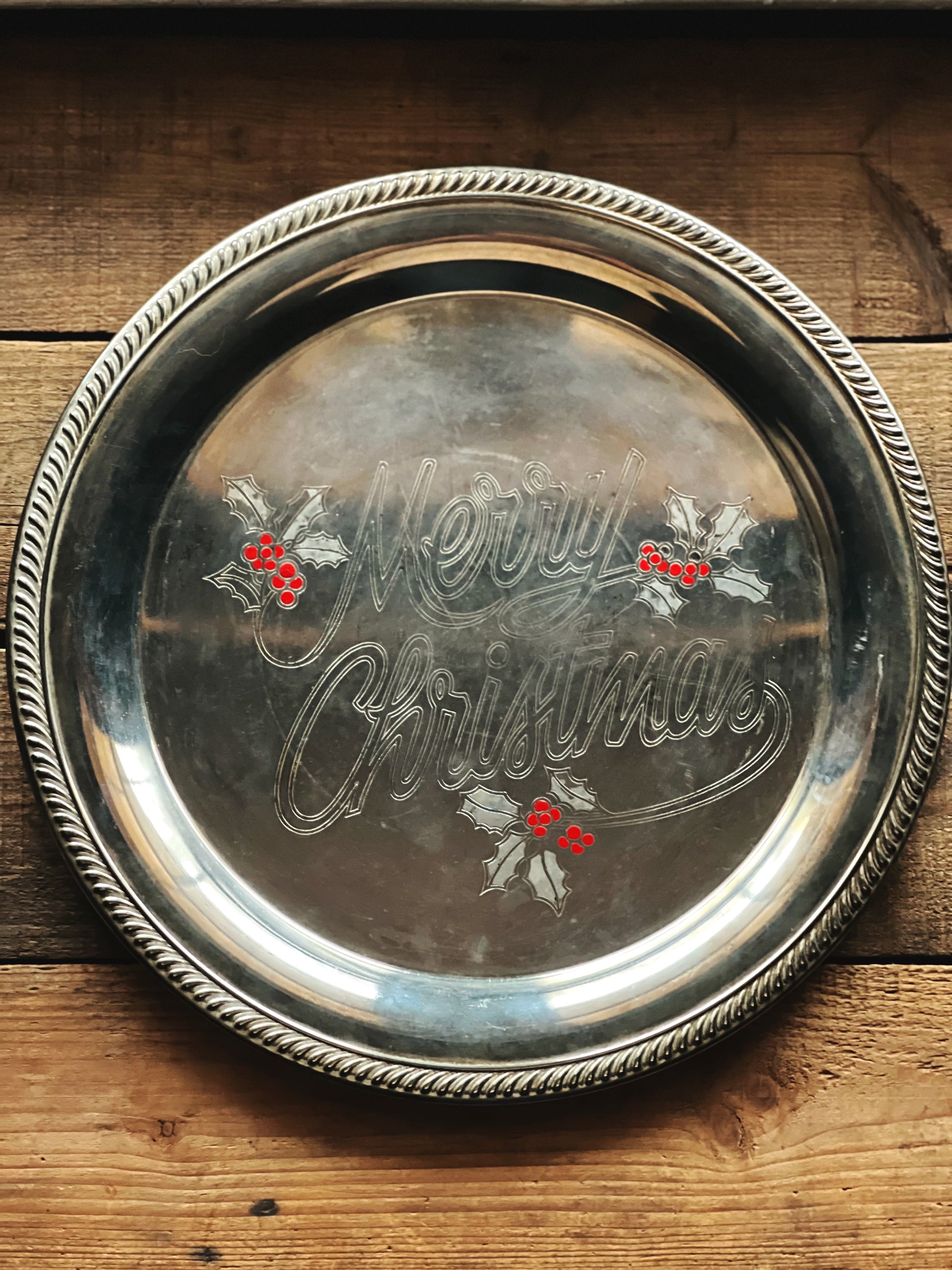 round silver serving tray that says Merry Christmas