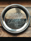 silver tray on a wooden surface