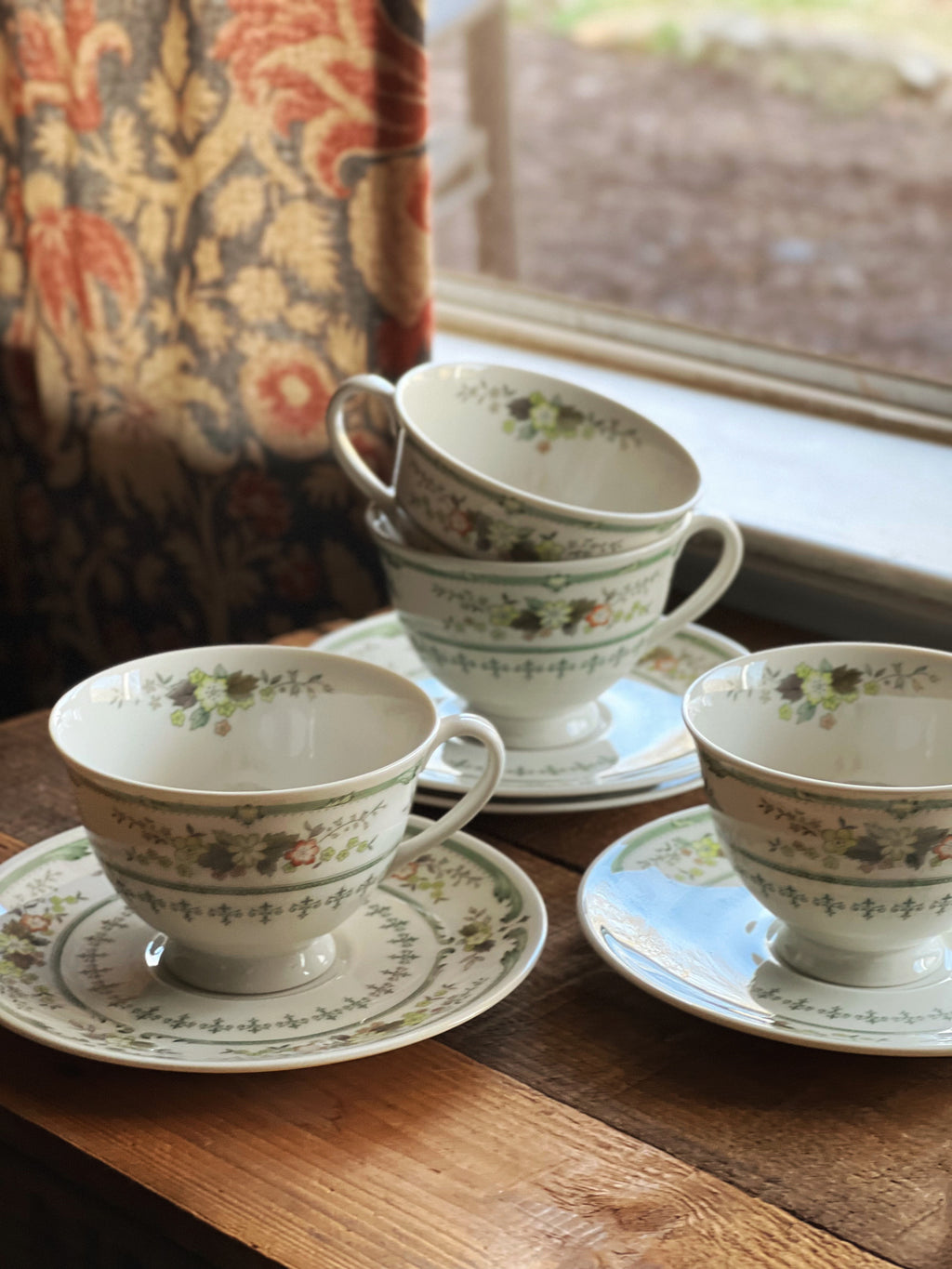 Vintage Royal Doulton Provencal tea cup with green floral pattern and matching saucer
