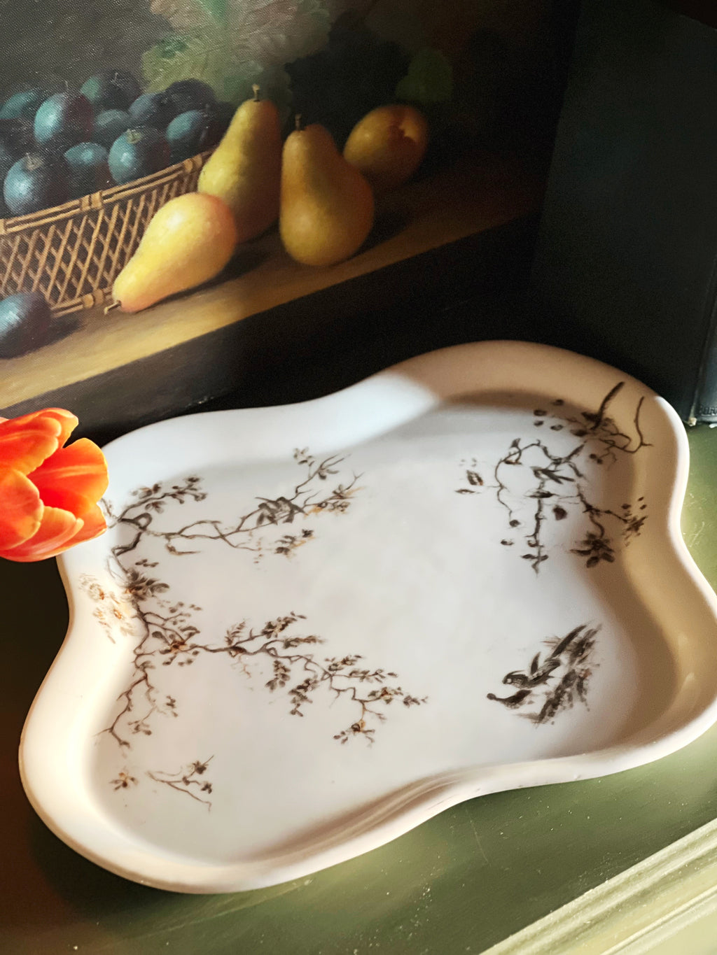 Antique porcelain serving tray with floral transferware pattern and softly curved handles