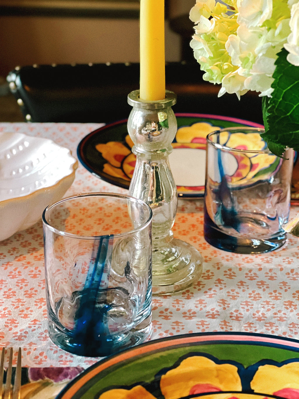 Set of 4 vintage cobalt blue swirl old fashioned glasses on a table setting