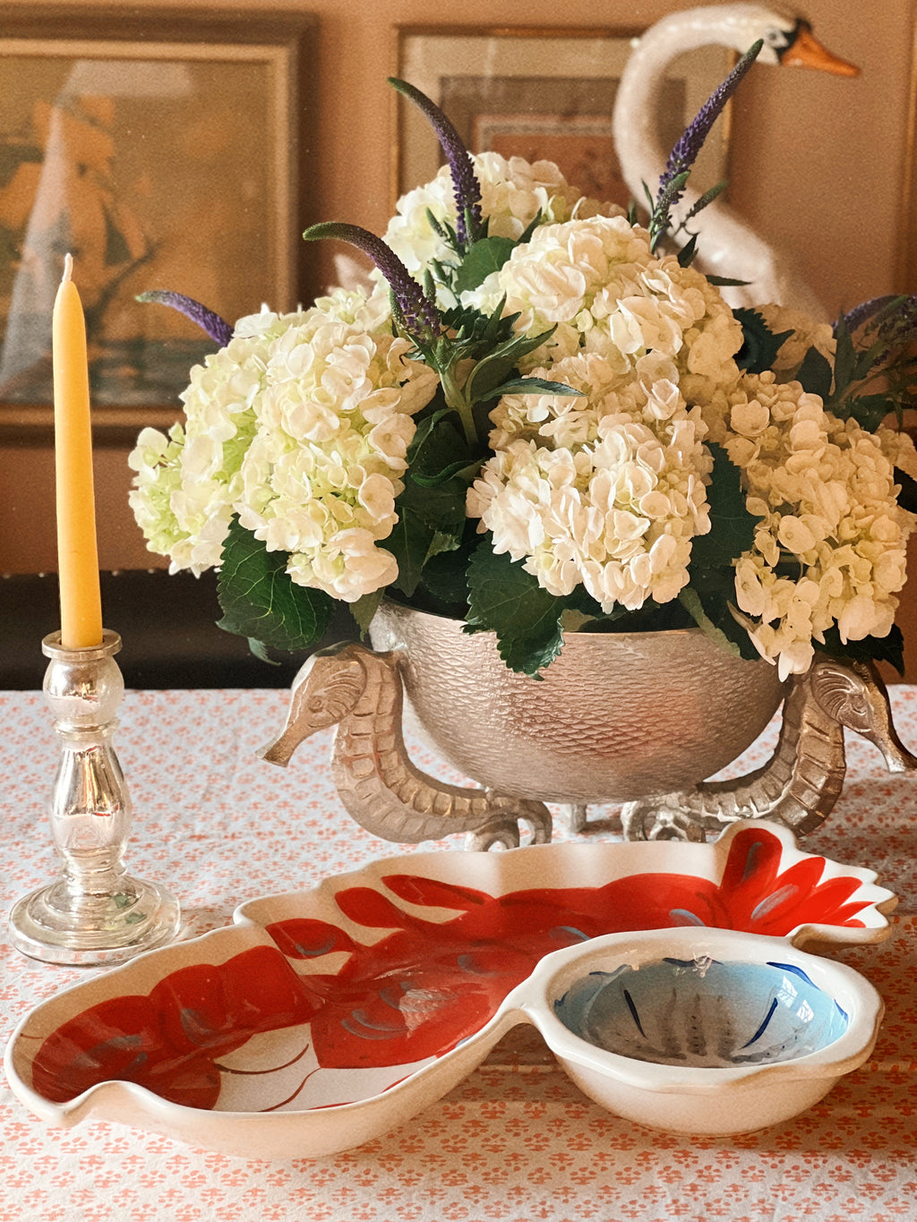 Coastal table with lobster serving platter used for entertaining
