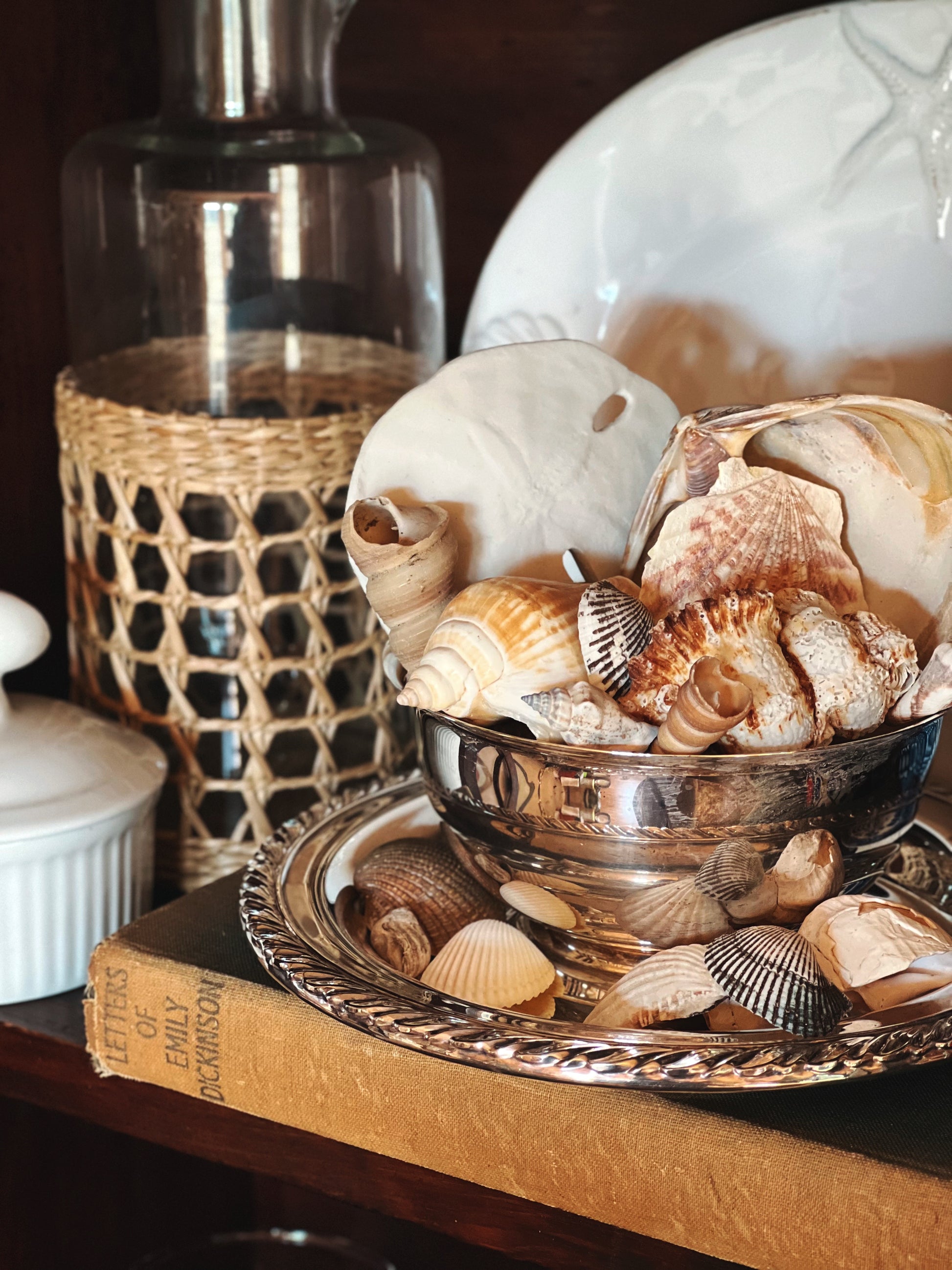Vintage Wm A Rogers silver serving bowl styled with shells as a decorative accent
