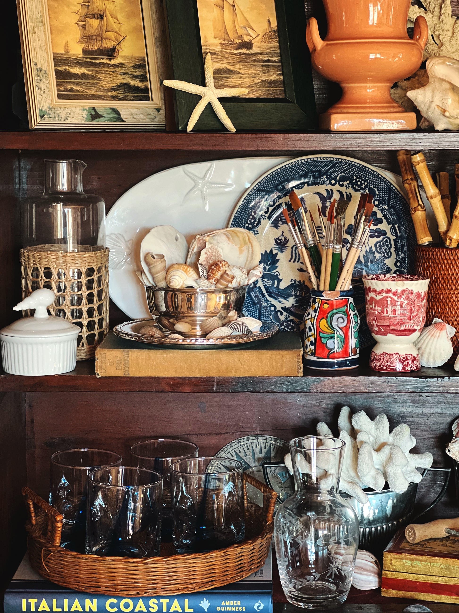 Coastal serving platter displayed on shelf with decor