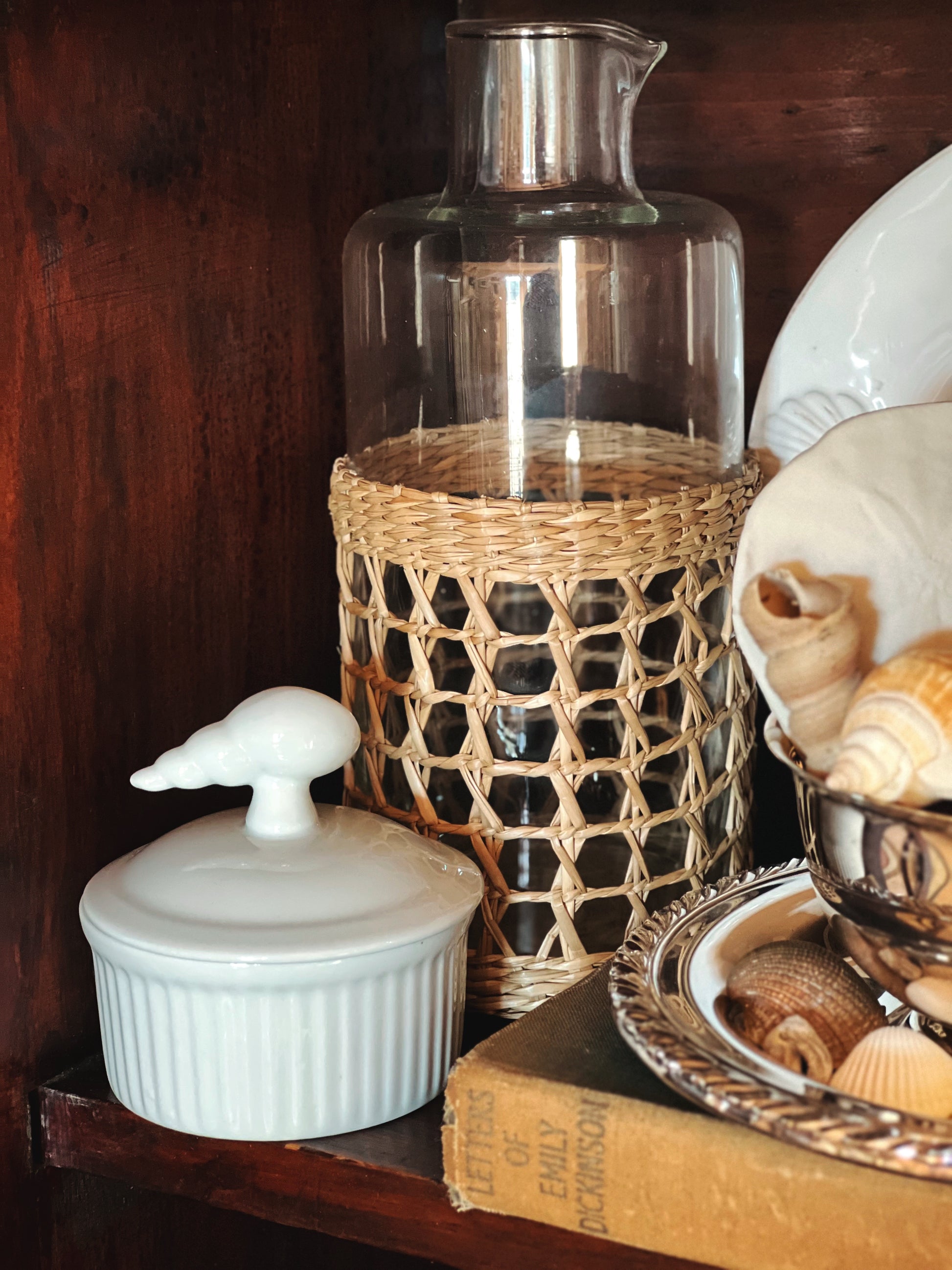 Coastal ramekin with shell lid styled on shelf, nautical kitchen decor