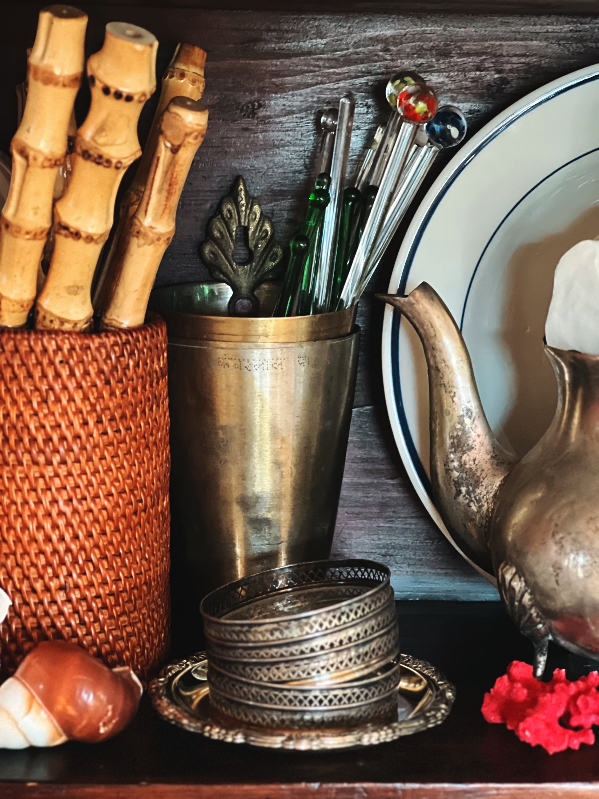 Sterling silver coasters in layered vignette setting