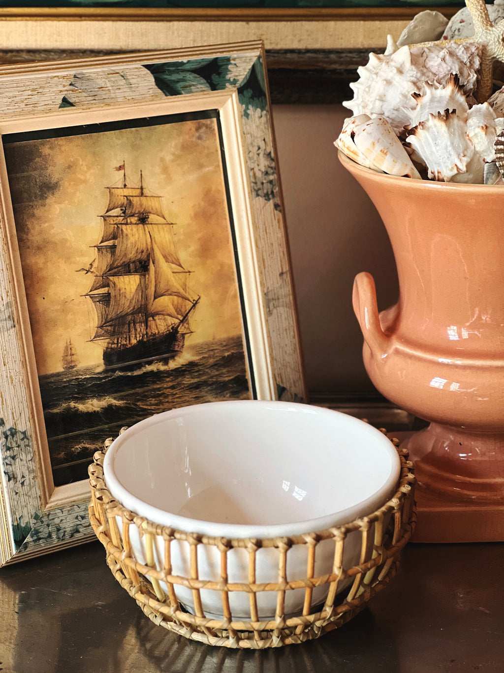 Ceramic condiment bowl with bamboo holder styled with vintage decor and pottery