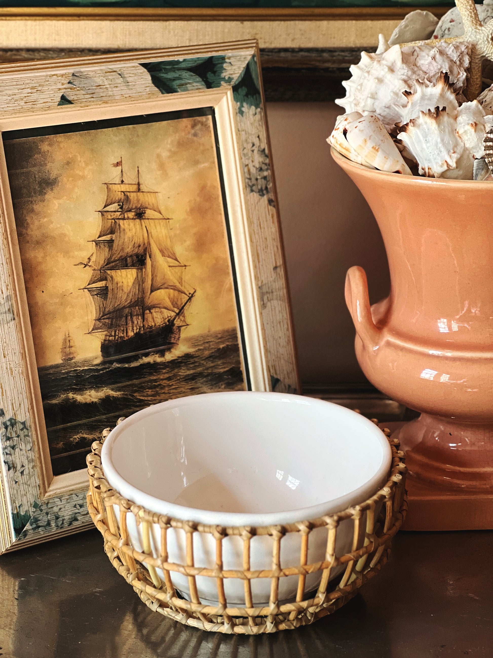 Ceramic condiment bowl with bamboo holder styled with vintage decor and pottery