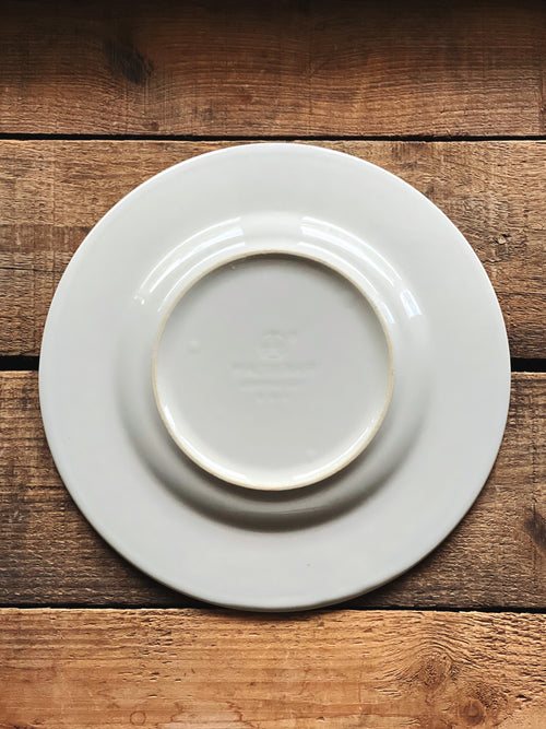 Underside of a vintage Pfaltzgraff Springwood salad plate.