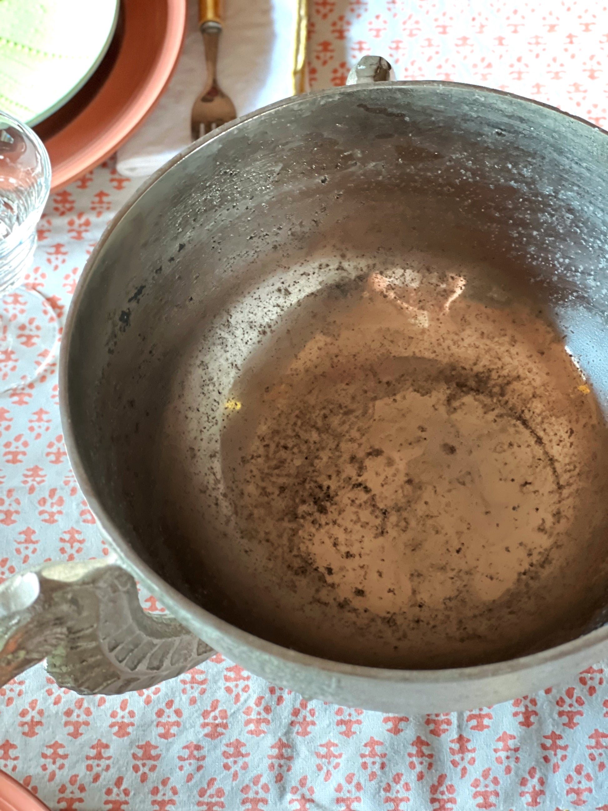 Interior of vintage silver seahorse bowl showing natural wear and patina