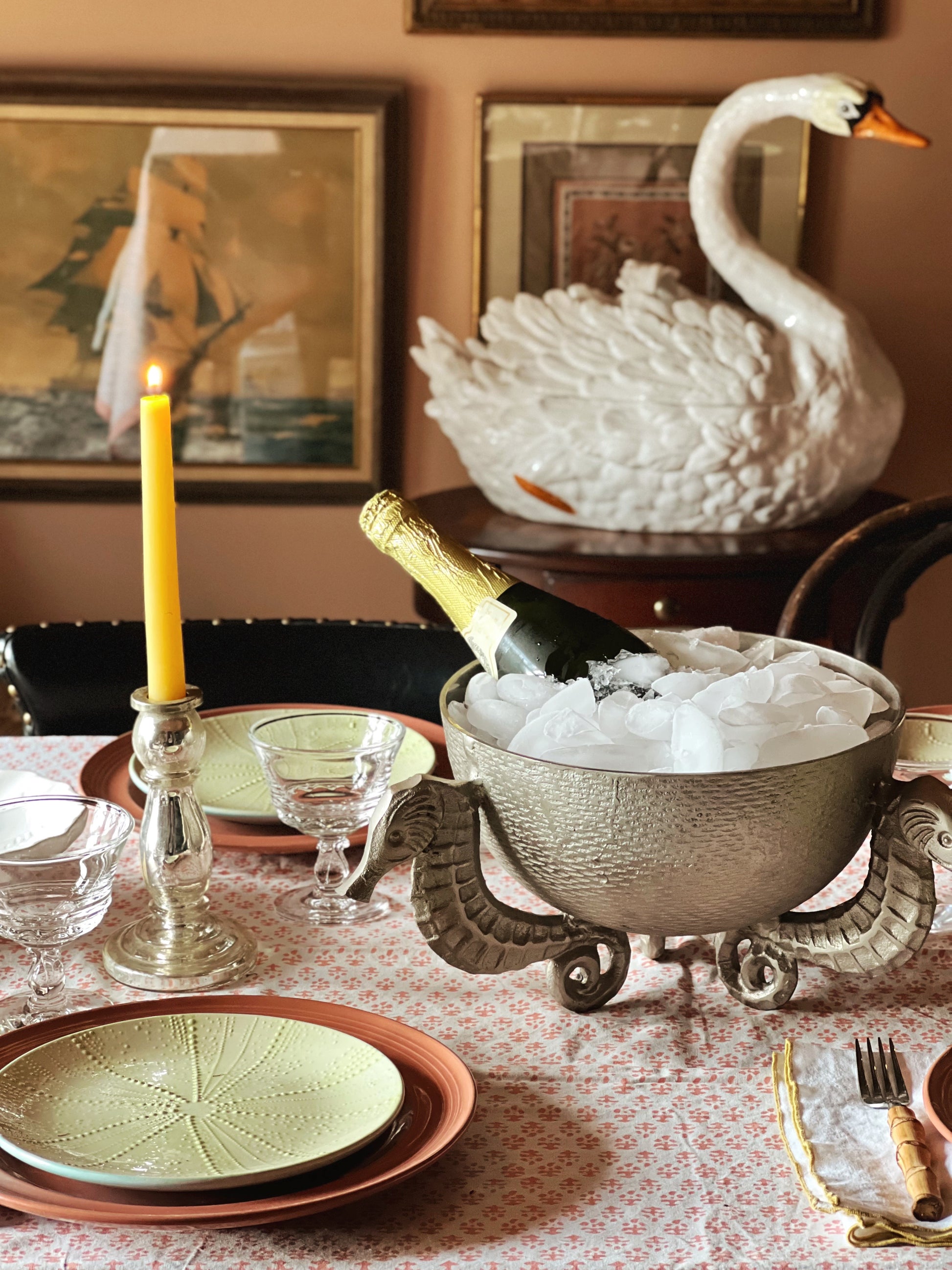 Close-up of detailed seahorse base on vintage silver centerpiece bowl