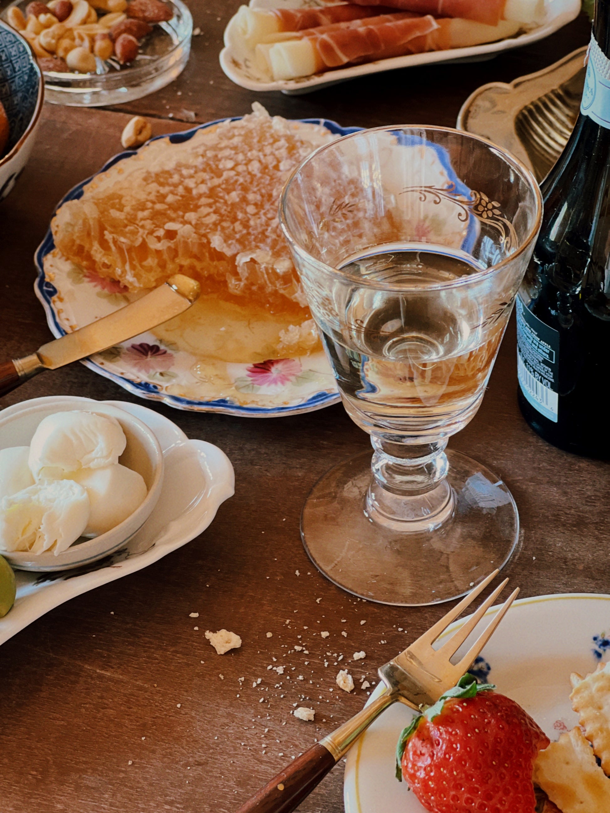 vintage petite wine glass on a table with charcuterie