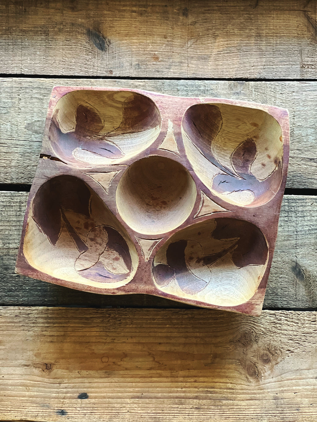 carved wooden divided snack dish with multiple compartments