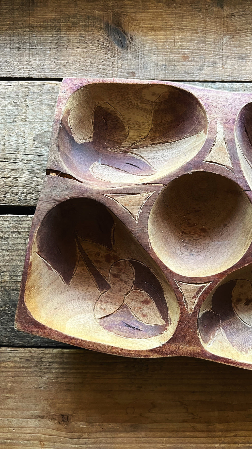 vintage wood serving tray showing carved compartments and grain detail