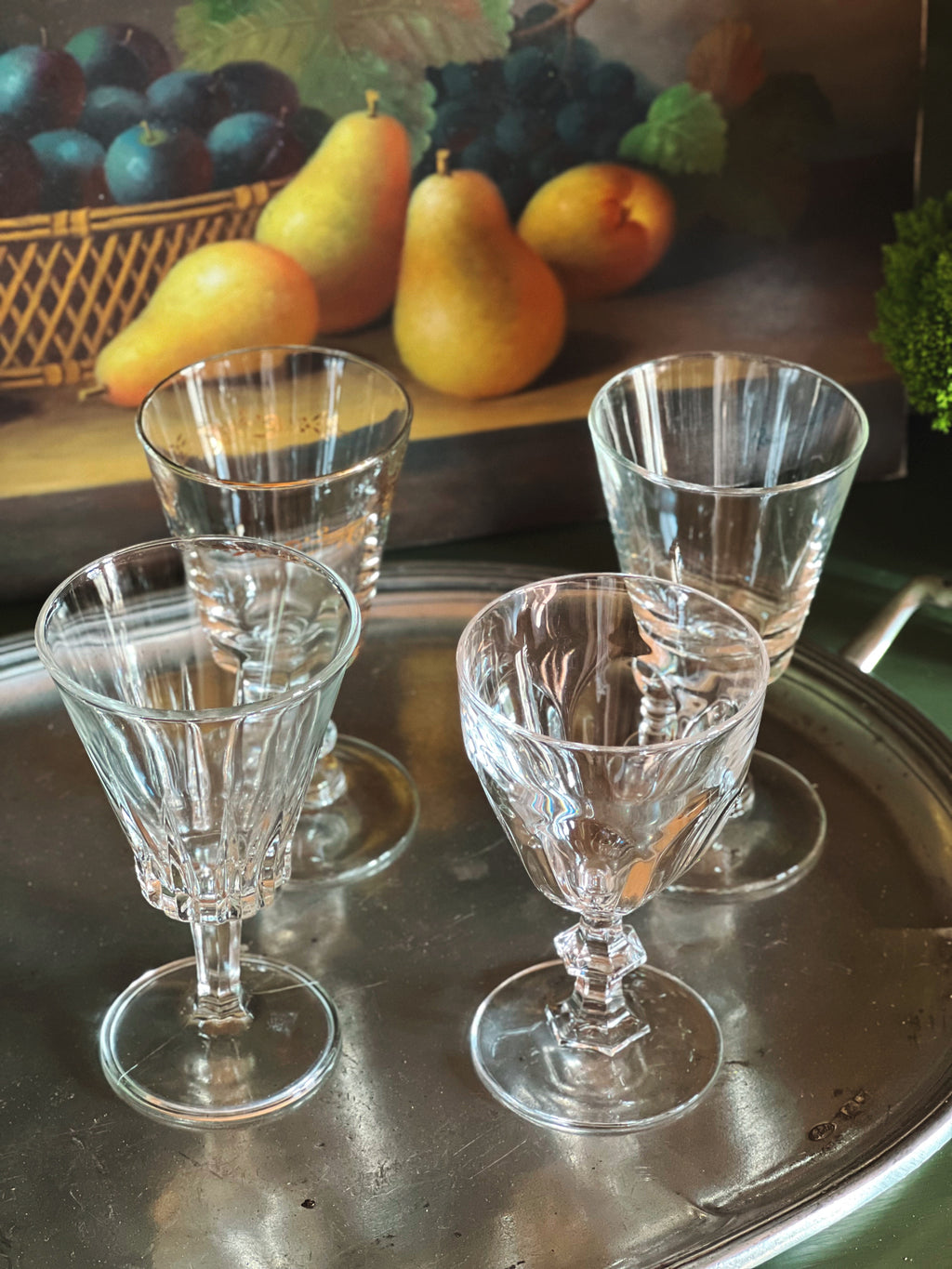 overhead angle of petite wine glasses in a mix match set 
