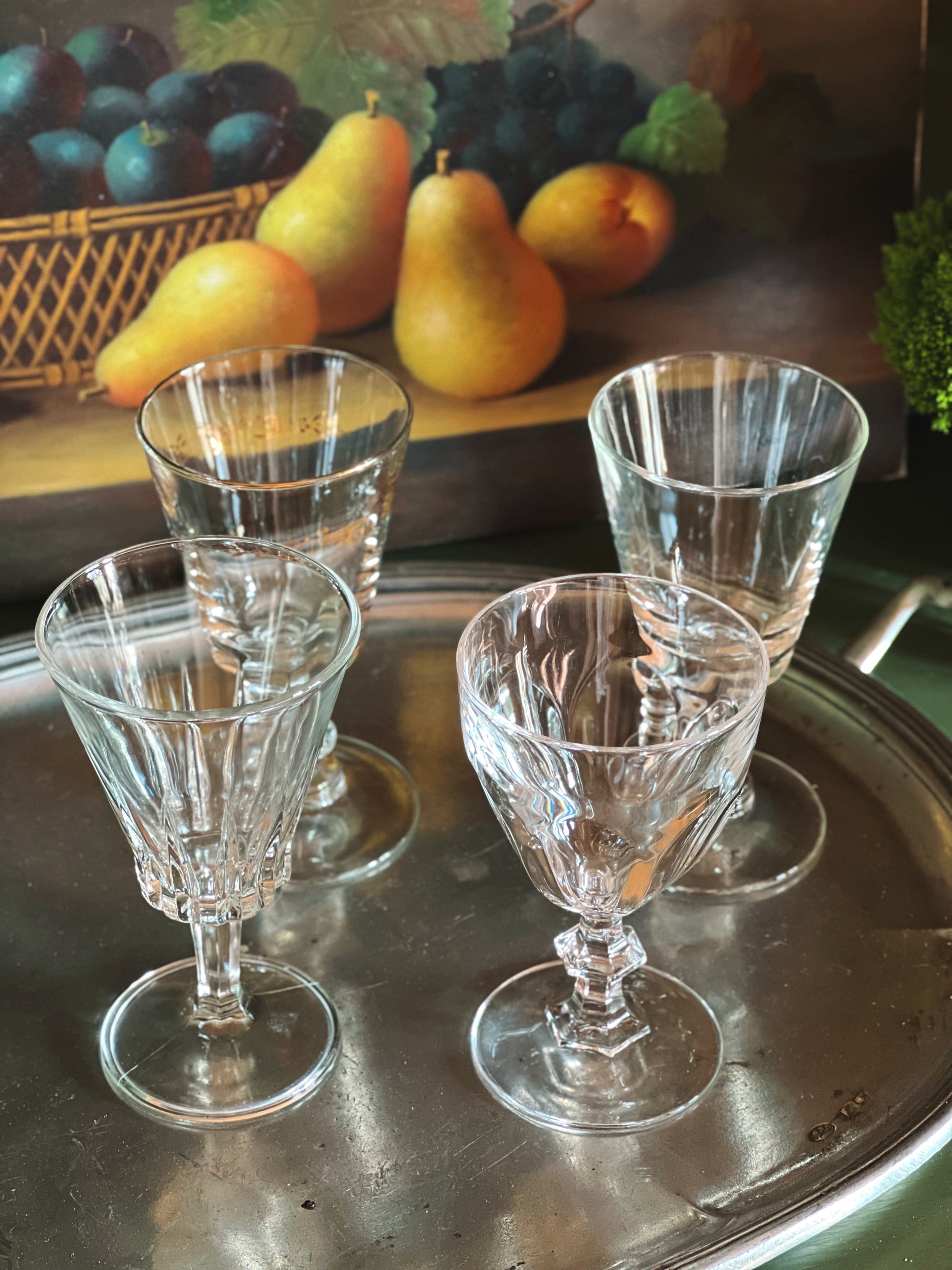overhead angle of petite wine glasses in a mix match set 