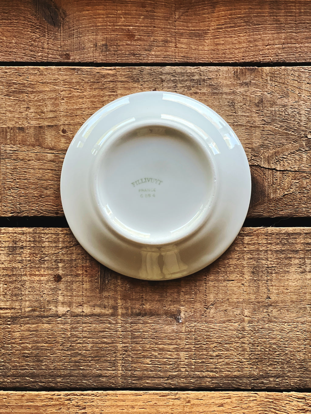 Small vintage French porcelain saucer for teacup in classic white finish