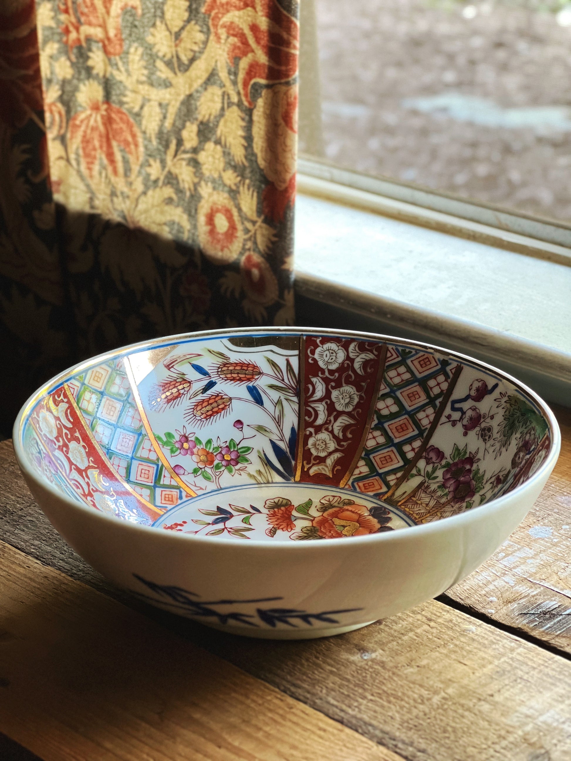 Side profile of vintage decorative bowl showing depth and shape