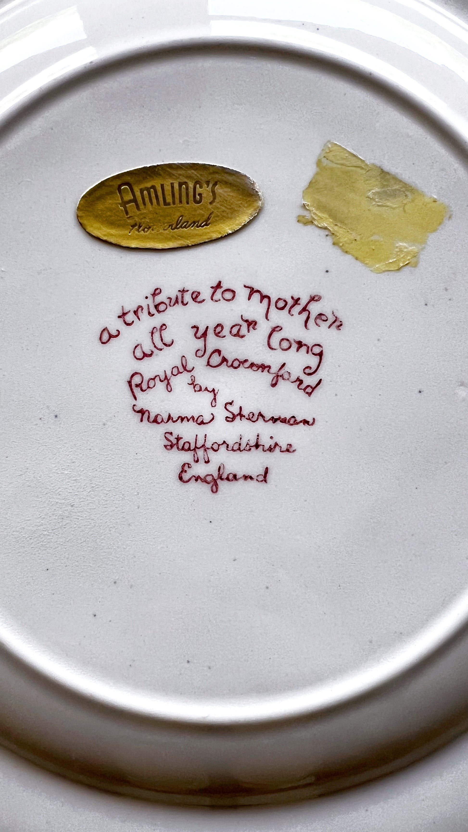 Close up of Norma Sherman signature and plate detail