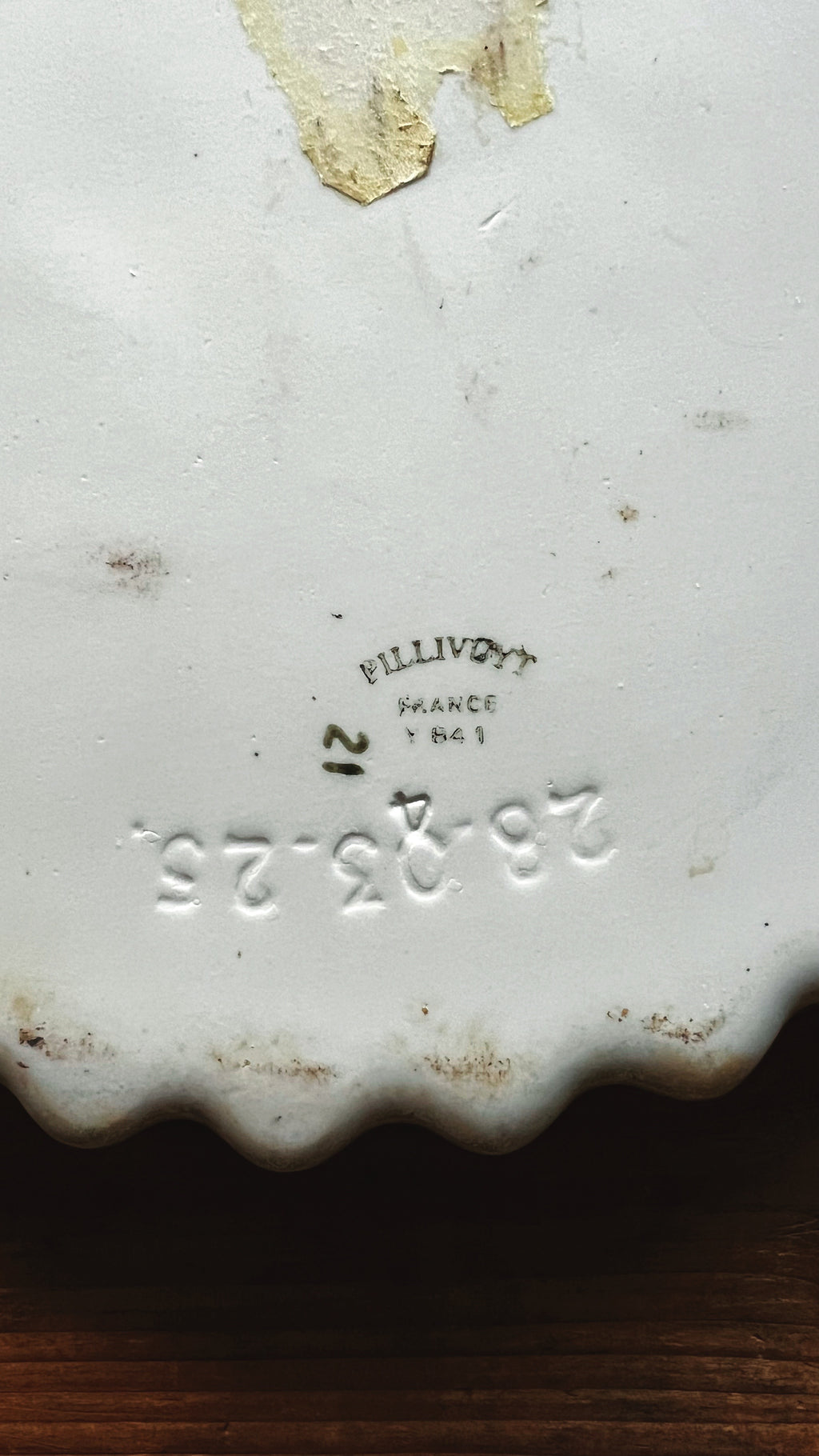 Close up of Pillivuyt France maker mark on underside