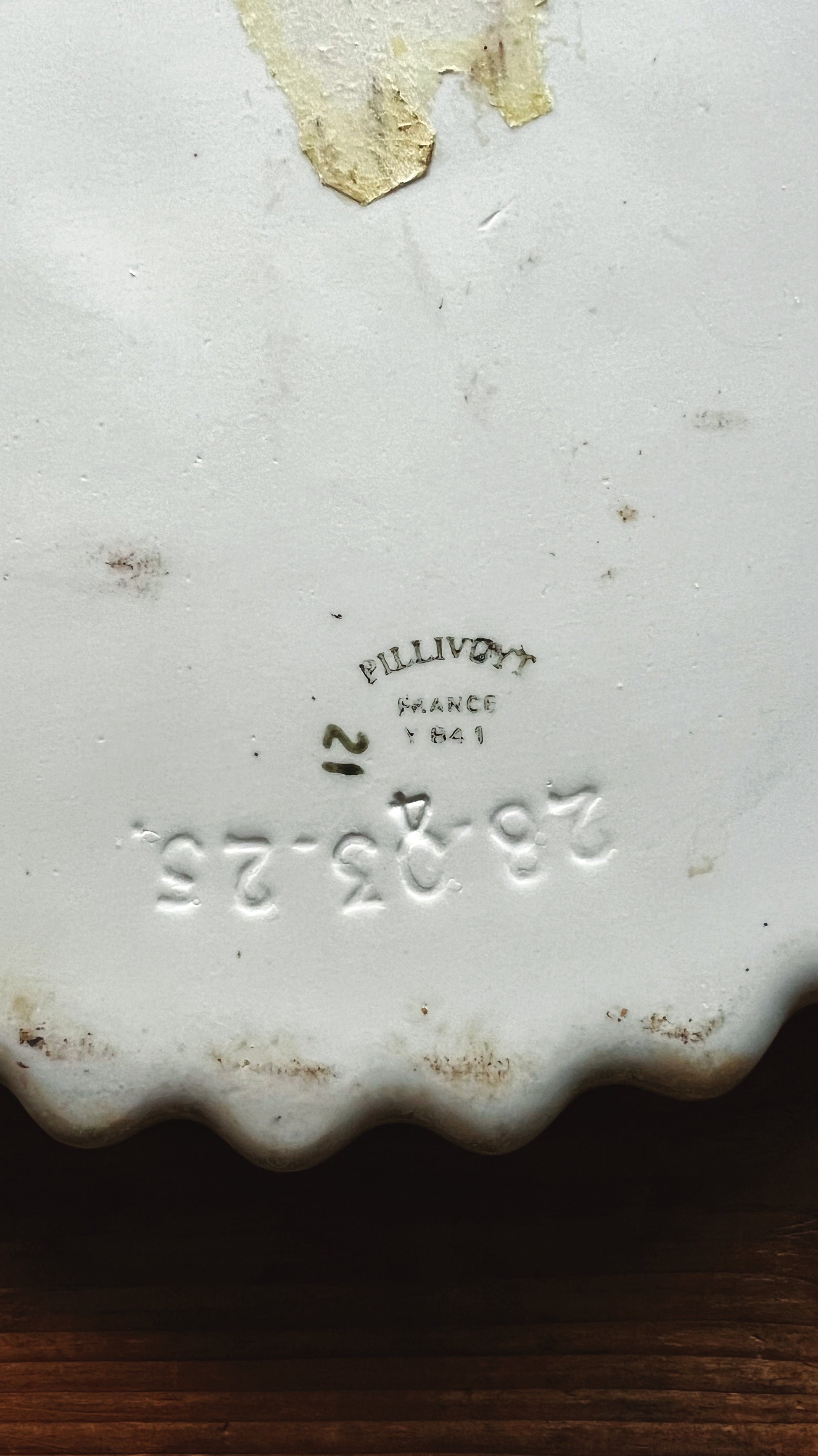 Close up of Pillivuyt France maker mark on underside