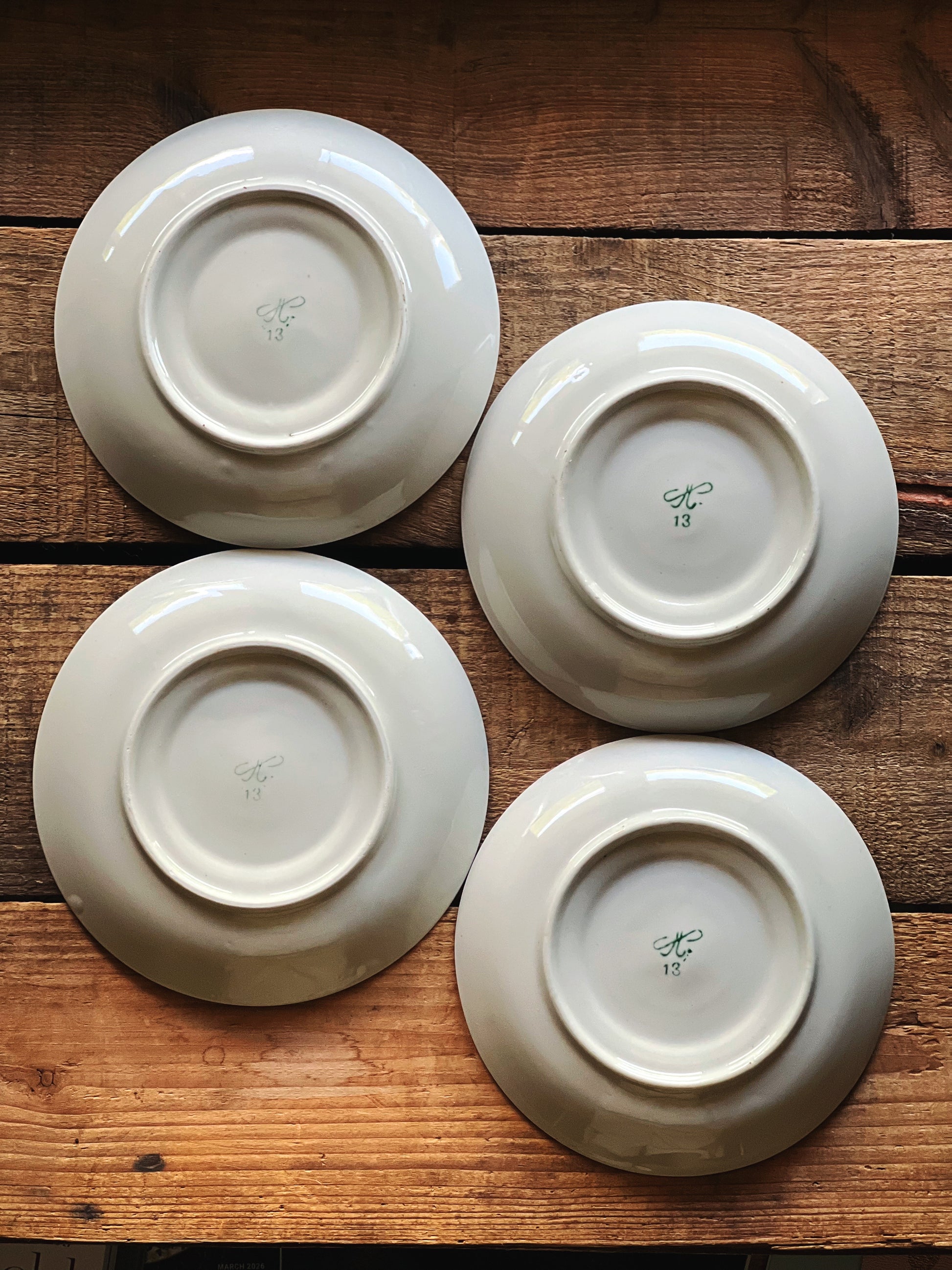 Bottom view of saucers showing base and maker marks
