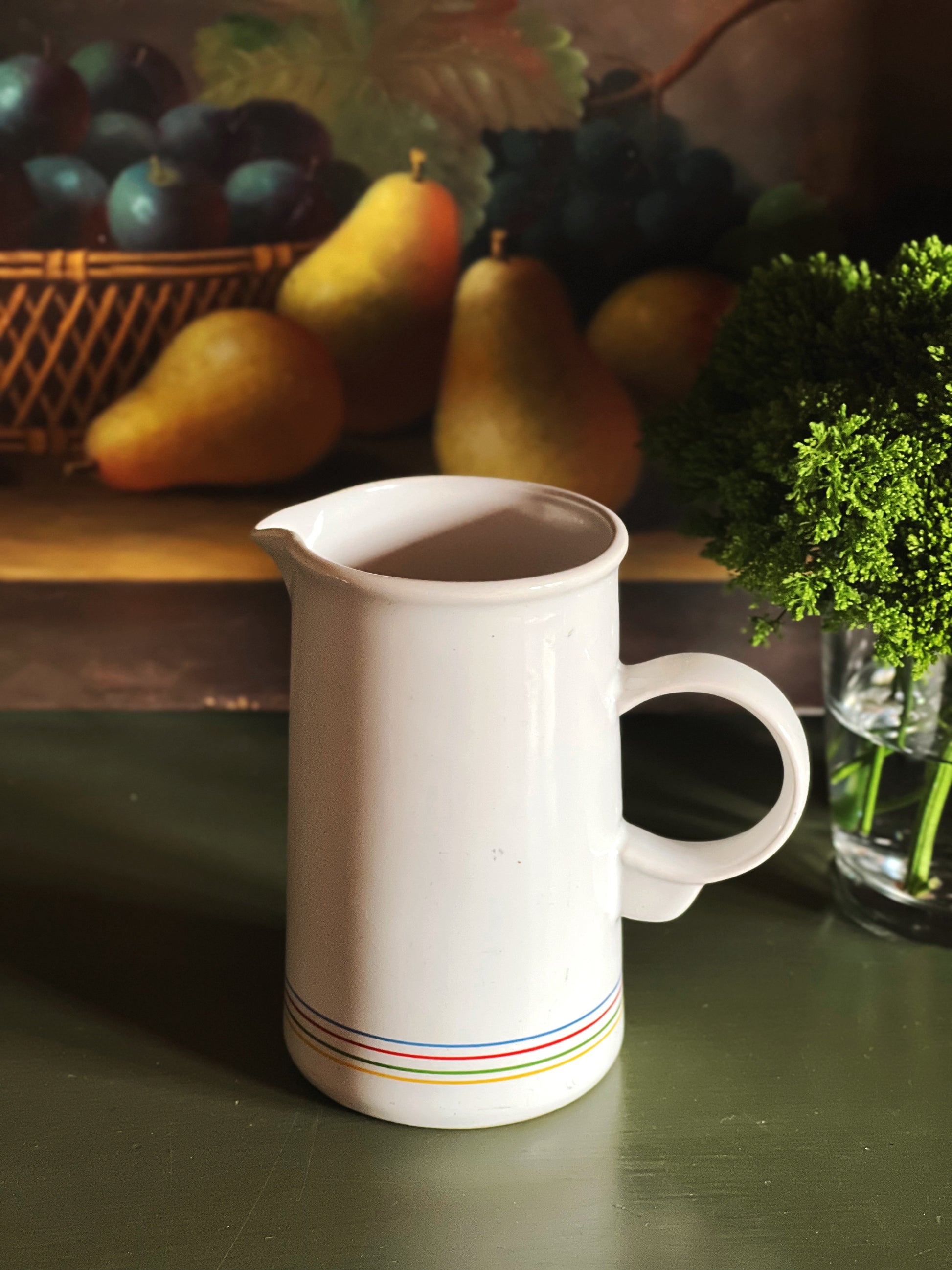 Vintage Epoch Korea striped ceramic creamer with loop handle styled with fruit still life background
