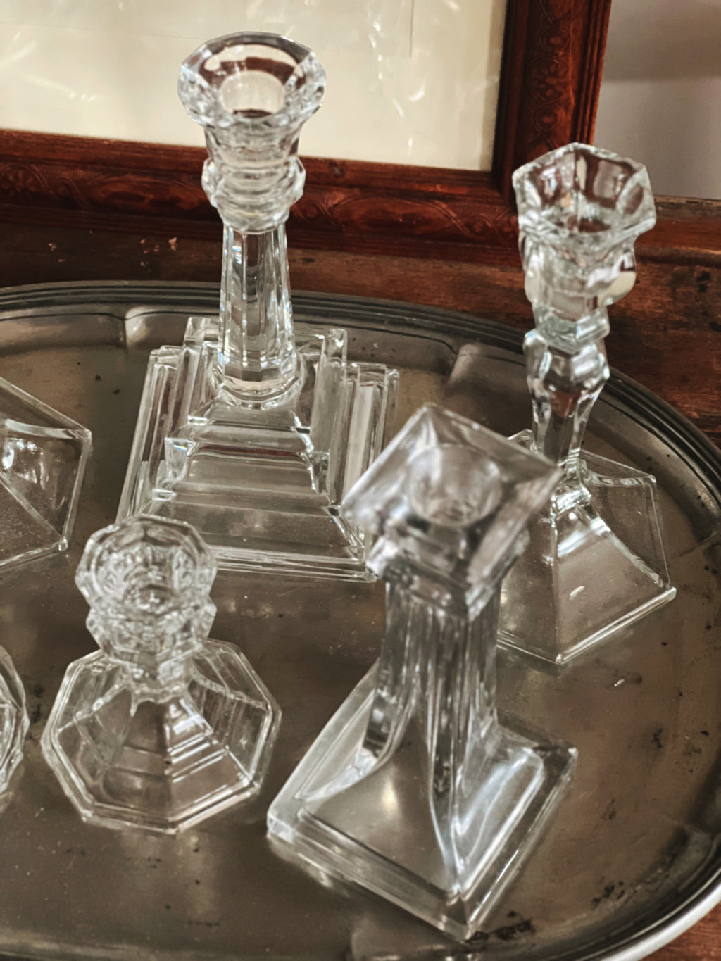 individual glass candlesticks showing shape variation